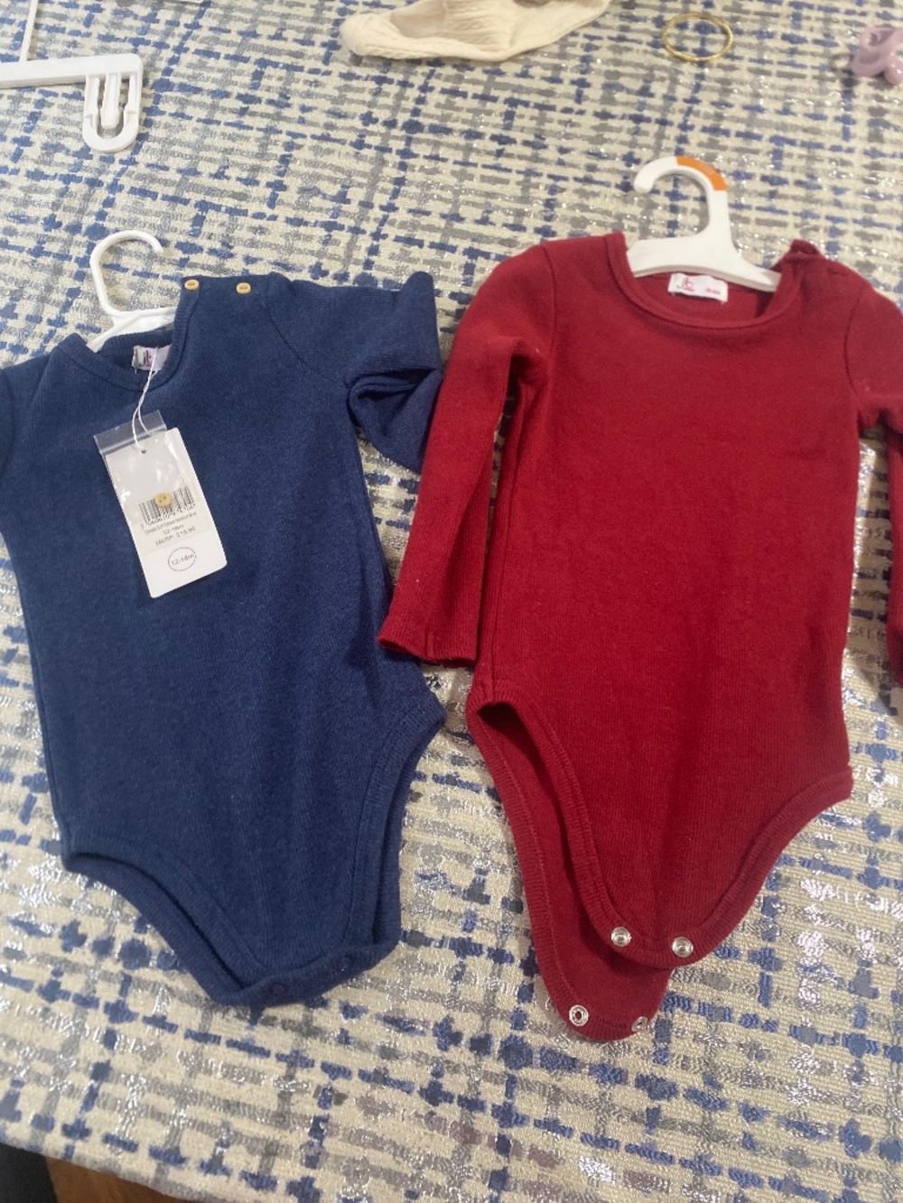 Red and blue baby onsie